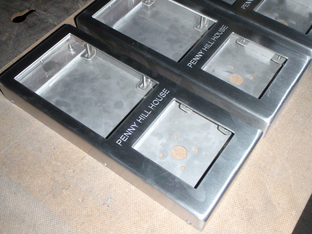 stainless steel door entry boxes detailed with home name