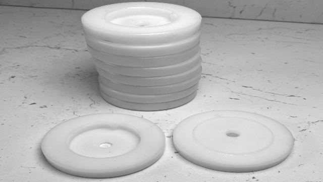 discs machined from white Acetal